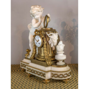 A Fine Quality French Gilt Bronze and Carrara Marble Figural Clockset